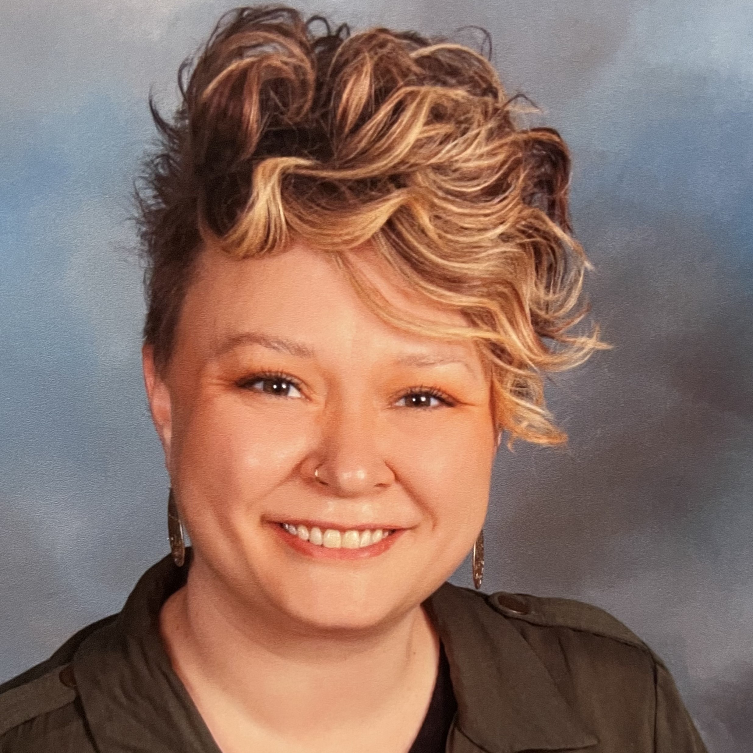 Headshot of Melisa Walker smiling.