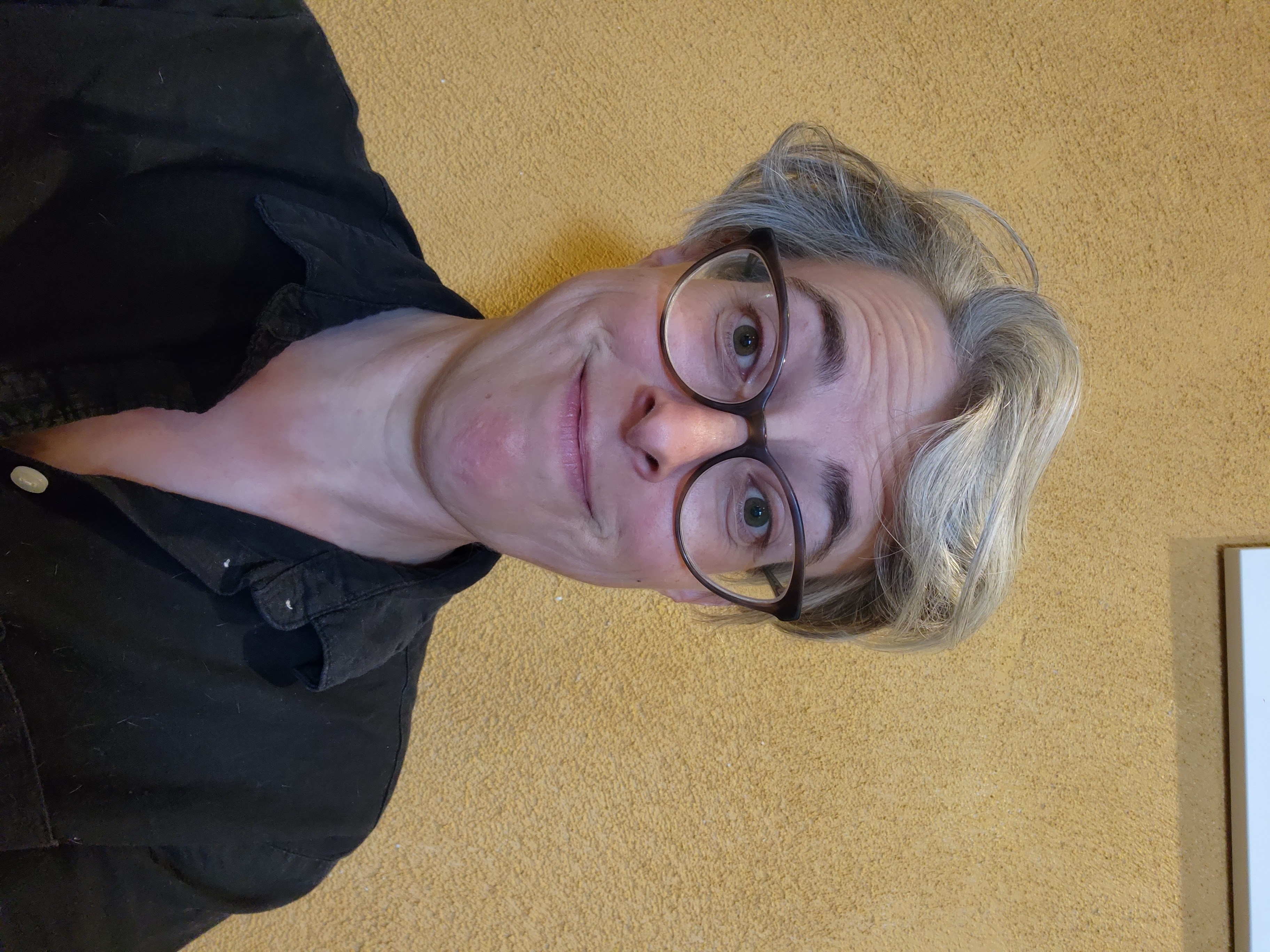 headshot of Margo Gustina